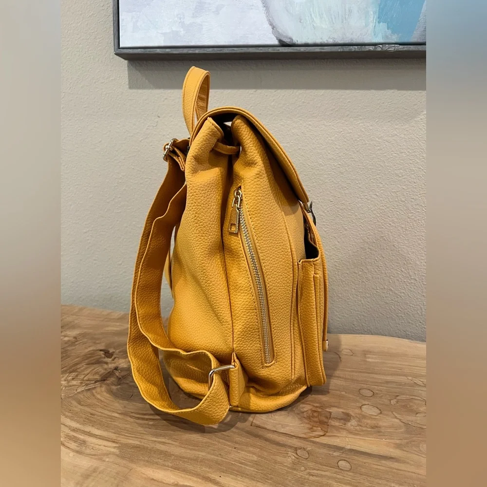 Yellow Textured Pleather Backpack with Silver Clasp